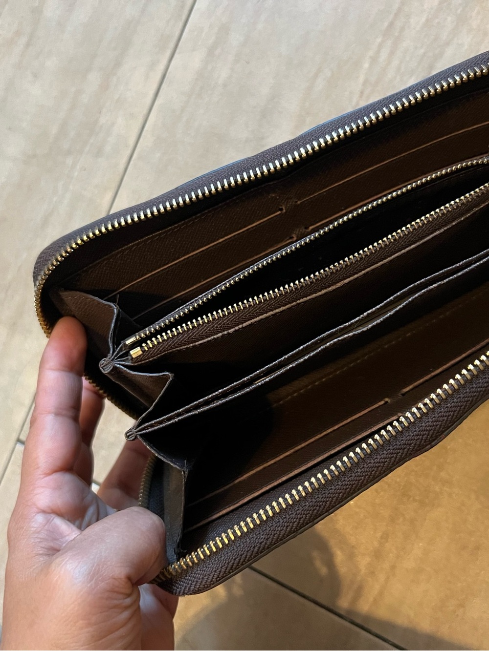 Louis Vuitton Damier Ebene Zip Around Wallet - Brown